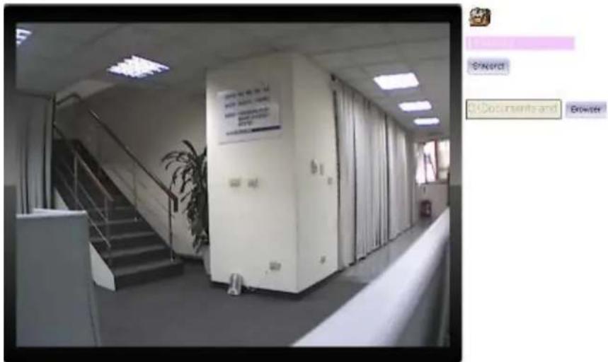 Black-and-white photo of an office hallway with server racks and visible signage, including a 'Document and Browser' button.