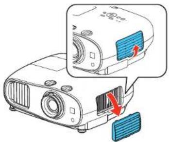 Diagram showing a projector with labeled components and directional arrows indicating action or movement