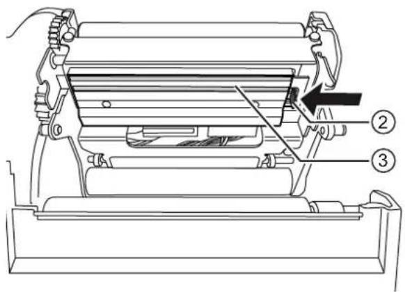 Technical diagram of a mechanical device with numbered components and directional arrow indicating assembly or operation.