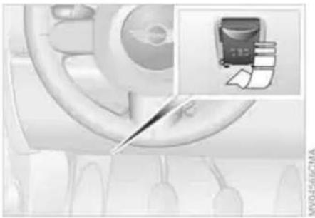 Medical procedure image showing a surgical tool in use on a patient's arm, with an inset image of a medical device (no visible text or symbols)