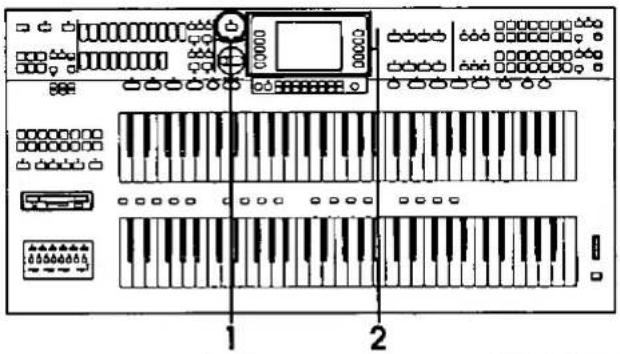Diagram of an electronic control panel with labeled parts, showing keys and audio input ports