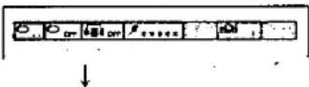 Scanned image of a toolbar with icons and a downward arrow, likely indicating a function or process step.