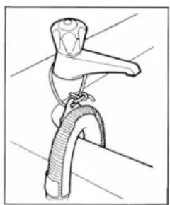 Line drawing of a bicycle with a handle and rope (no text or symbols).