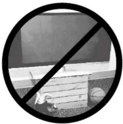 Black and white circular sign with a diagonal line crossing over a building, no text or symbols present.