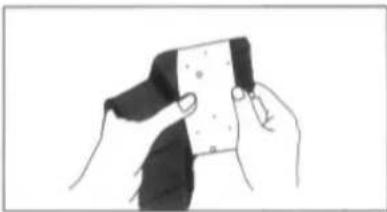 Illustration of hands holding a card or card with a black strap (no text or symbols visible)