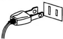 Simple line drawing of a plug with a cable and two outlets (no text or symbols)