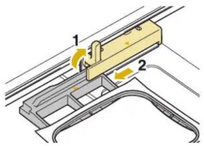 Technical diagram showing a mechanical assembly with labeled components and directional arrows indicating motion or movement.