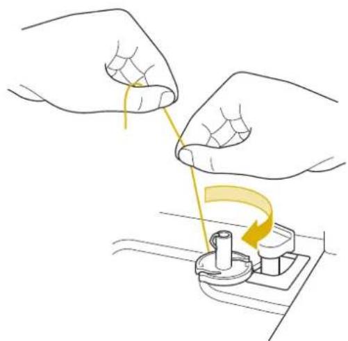 BABY LOCK Ellisimo Gold 2 BLSOG2 - Cut the thread near the bobbin and hold the thread end with your left hand. Unwind the thread counter clockwise near the bobbin winder seat with your right hand as shown below. - 1