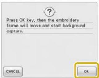 Press OK key, then the embroidery frame will move and start background capture.