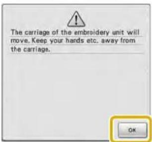 The carriage of the embroidery unit will move. Keep your hands etc. away from the carriage.