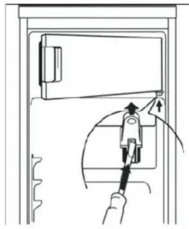 Line drawing of a door with a tool inserted, showing a hand holding a clip and arrow indicating direction (no text or symbols)