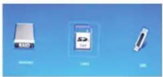 Three electronic devices on a blue background: two white electronic devices and one rectangular device (no visible text or symbols)