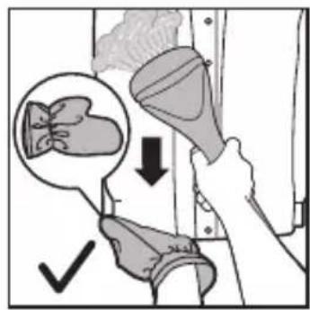 Medical illustration showing a hand holding a device with a magnified view of a patient's abdomen, accompanied by a checkmark indicating a medical procedure.