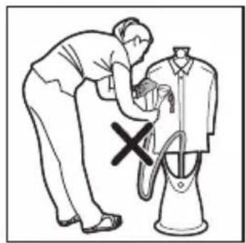 Illustration of a person using a handheld device to clean or adjust equipment, with a cross mark indicating no text or symbols.