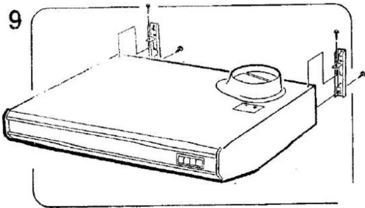 Line drawing of a device with a lid and ports, no text or symbols present