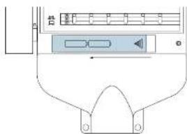 Diagram showing a device with labeled components and directional arrows, likely indicating movement or control.