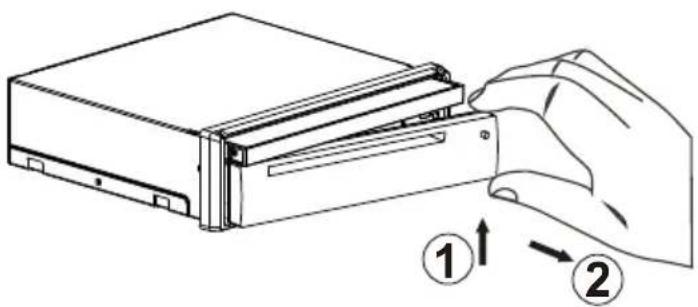 Diagram showing a hand inserting a physical component into a device, with numbered instructions indicating the process.