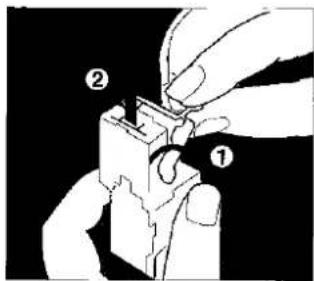Diagram showing a hand using a tool to adjust or install a component, labeled with parts ① and ②.
