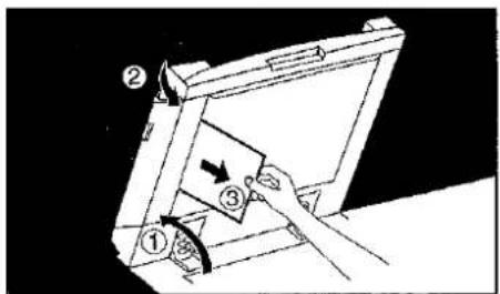 Diagram showing a hand pressing down an object with numbered parts and directional arrows indicating motion or force.