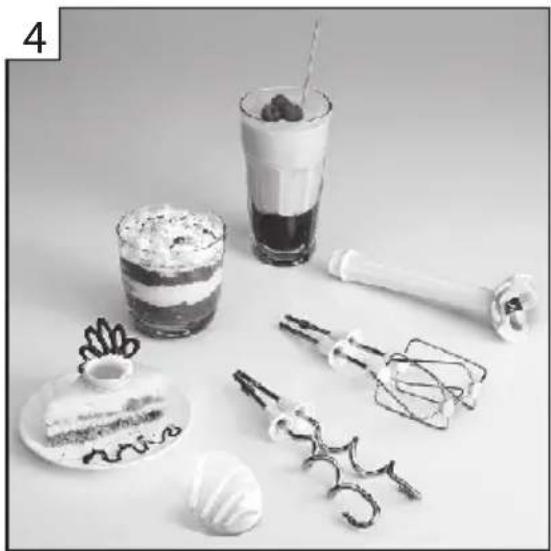 Black-and-white photo of a breakfast arrangement with a cake, milkshake, kitchen utensils, and a straw (no text or symbols visible)