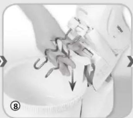 Close-up of hands using a tool to handle a metal hook in a bowl, with arrows indicating the process (no text or symbols visible)