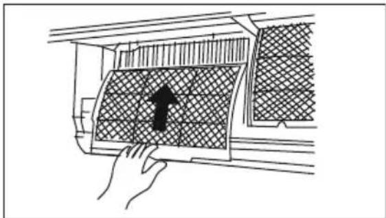 Hand placing a grid-patterned panel with an upward arrow, inside a vehicle air vent (no text or symbols)