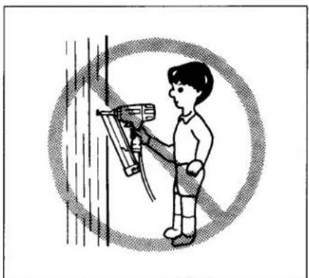 Illustration of a person using a spray gun to clean or disinfect the wall (no text or symbols present)