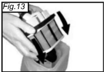 Close-up of hands holding a small electronic device with a black arrow indicating rotation (no text or symbols visible)