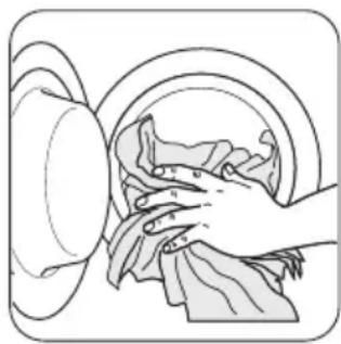 ZANUSSI ZWH 7103 P - Colocar a roupa no tambor - 1