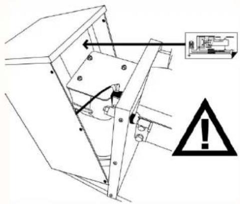 Technical diagram showing mechanical assembly with warning symbol and labeled components