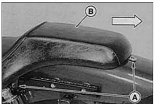 Technical diagram of a car's front seat with labeled parts A and B, showing mechanical components and directional arrow.