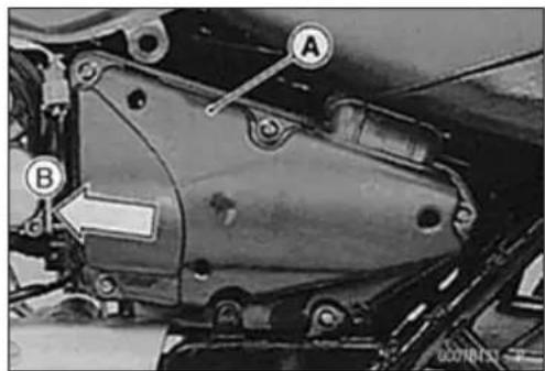 Technical diagram of a mechanical assembly with labeled parts A and B, showing structural components and an arrow indicating a specific component.