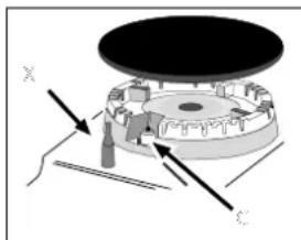 Mechanical assembly diagram showing a rotating component with labeled axes X and C (no text or symbols beyond labels)