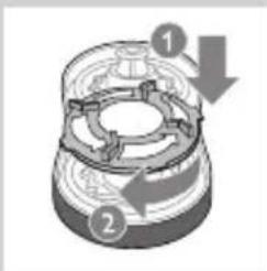 Technical diagram of a mechanical component with numbered parts and directional arrows indicating motion or flow.