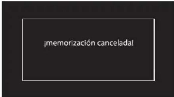 Warning text prompt in Spanish: '¡memorización cancelada!'