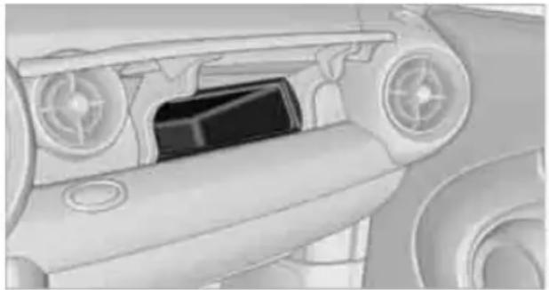 Close-up of a car dashboard and steering wheel (no visible text or symbols)