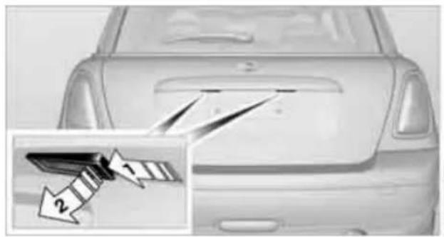 Front view of a car with a partially cut blade and arrow annotation (no text or symbols)