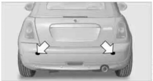 Front view of a silver sedan car with two white arrows pointing to the front side (no text or symbols visible)