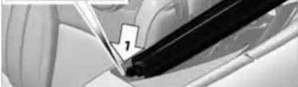 Close-up of a car's steering wheel being adjusted for steering (no visible text or symbols)