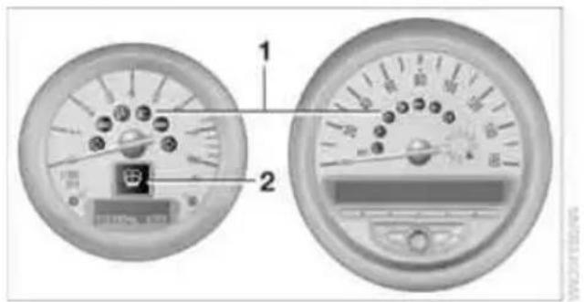 Diagram of a dual-wheeled meter with labeled parts, showing front and side views with measurement scales and indicators.