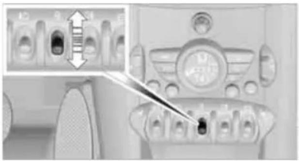 Interior view of a car air conditioner unit with control panel and fan (no visible text or symbols)