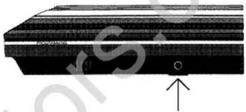 Close-up of a black electronic component with a small circular feature and an arrow pointing to it (no visible text or symbols)