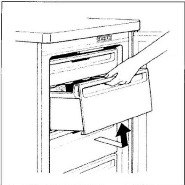 Line drawing of a hand inserting a drawer into a cabinet (no text or symbols)