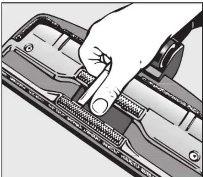 MIELE S 548 - En caso de haberse enrollado hilos o pelos en el eje de las ruedas - 1