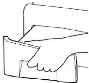 Line drawing of a hand holding a rectangular object, possibly a container or device (no text or symbols)