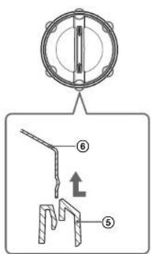 Technical diagram showing a mechanical assembly with labeled parts and directional arrows