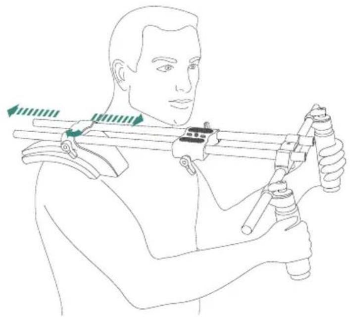 Line drawing of a person using a robotic arm with motion arrows indicating movement (no text or symbols)