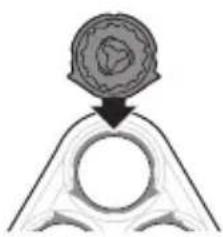 Simple line drawing of a mechanical or architectural component with a circular top and symmetrical base (no text or symbols)