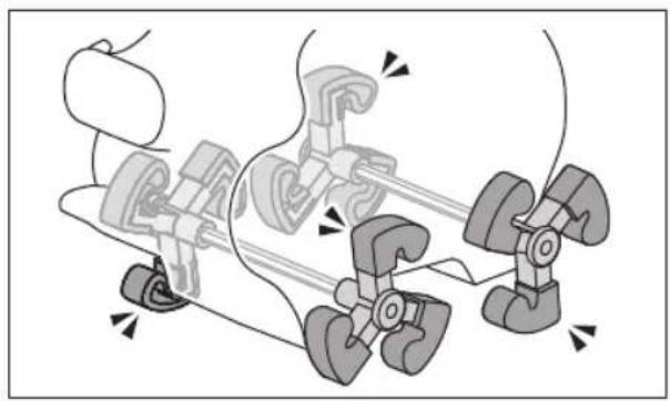 Mechanical assembly diagram showing three clamping components with arrows indicating motion direction (no text or labels)