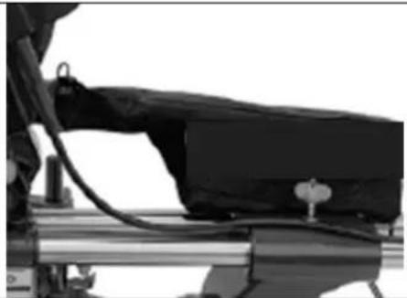Close-up of a mechanical assembly with wires and a black component (no visible text or symbols)
